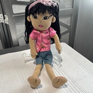 Pink and Tan Plush Doll with Asian-Inspired Features